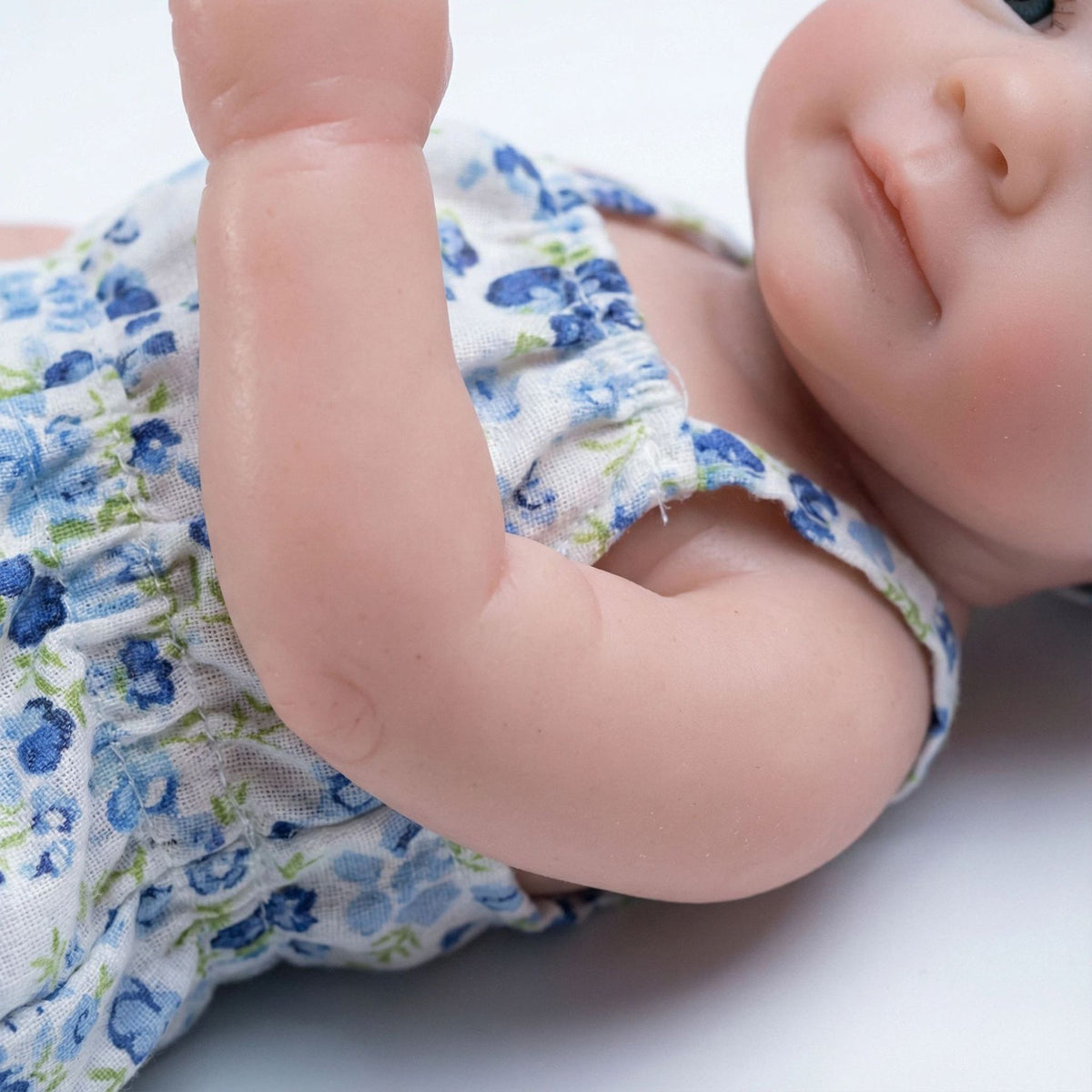 12 inch blue floral suspender jumpsuit, solid silicone reincarnation doll, giving children Christmas gifts